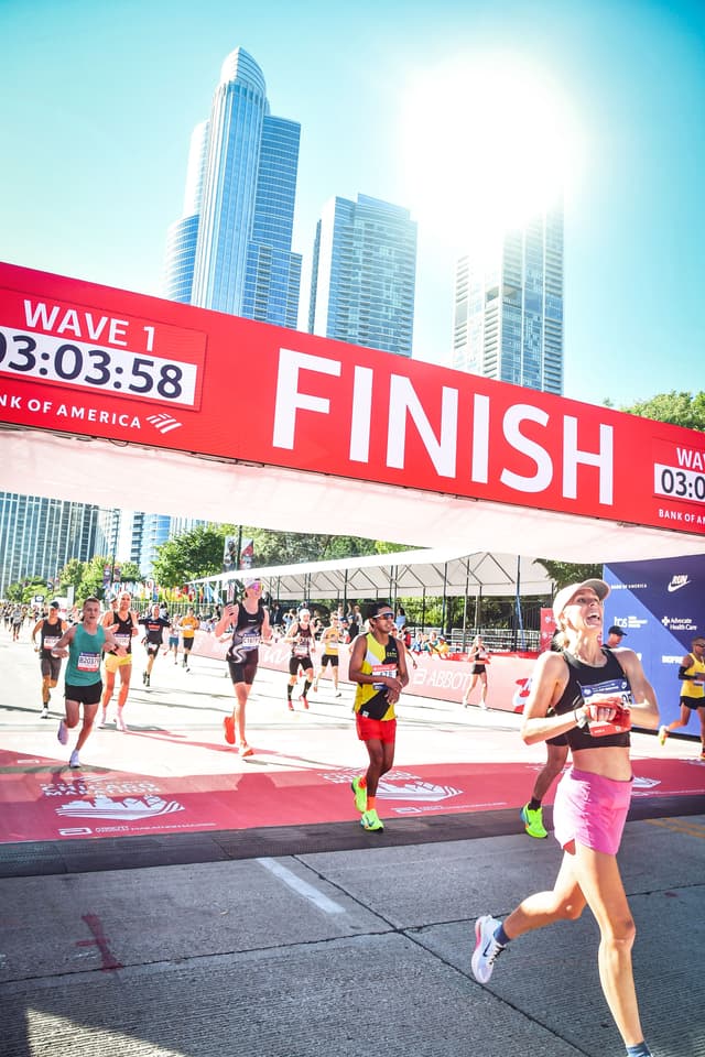 Jessica finishing the Chicago Marathon